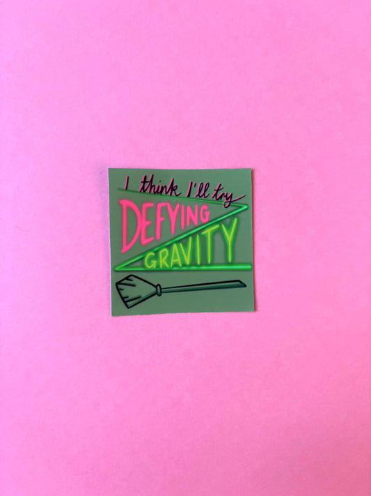 Defying Gravity Sticker